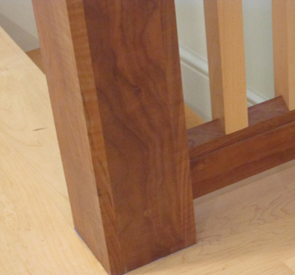 close-up of bottom of banister