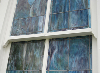 closer-up of sash work on stained glass windows set by Welch Millwork and Design